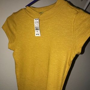 i’m selling a mustard yellow shirt.